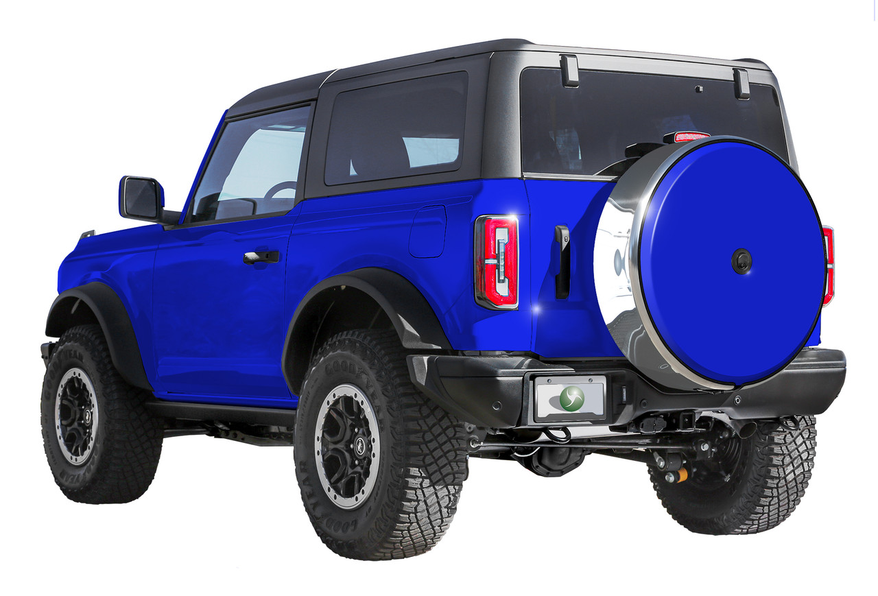 blue Ford Bronco with stainless steel spare tire cover