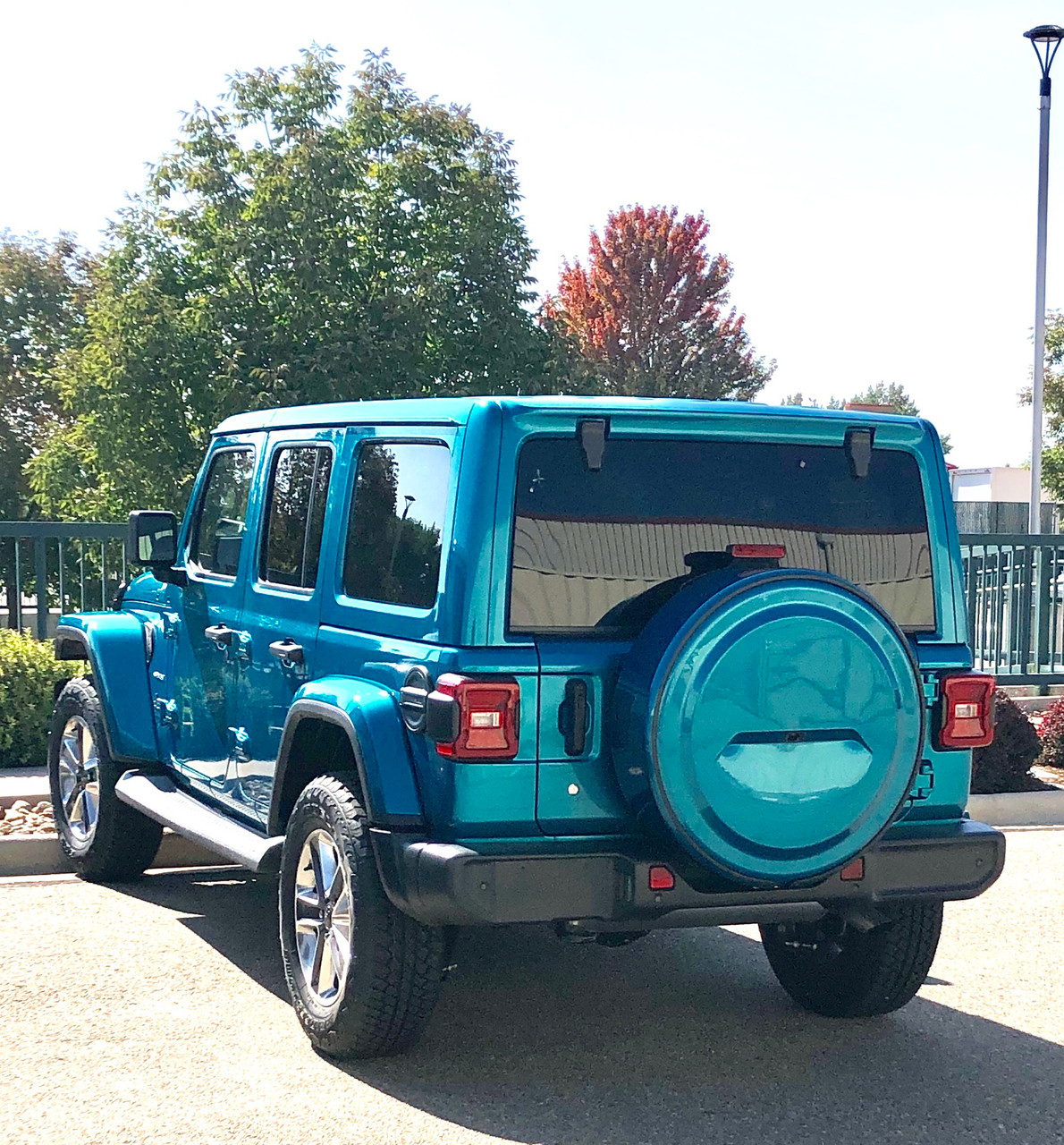 bright blue Jeep Wrangler JL outdoors