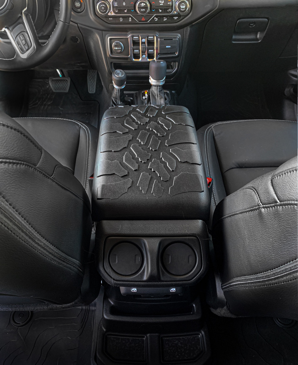 SUV interior with tire tread center console