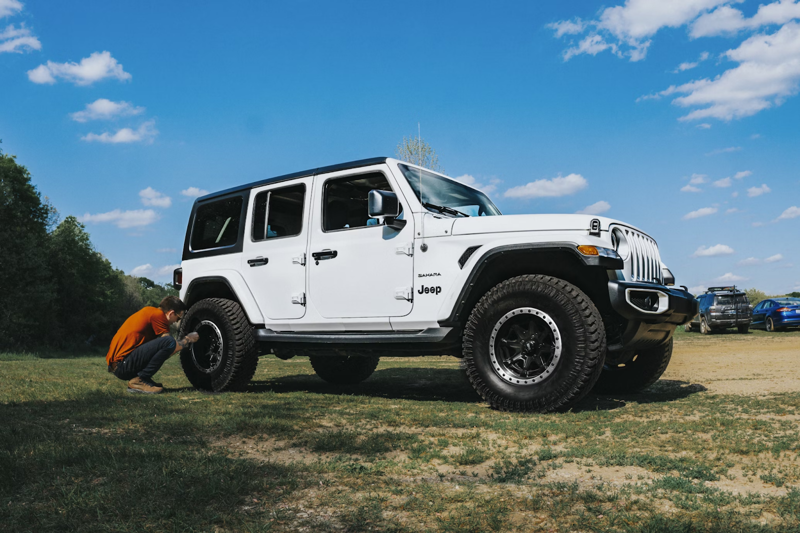 white jeep wrangler parked